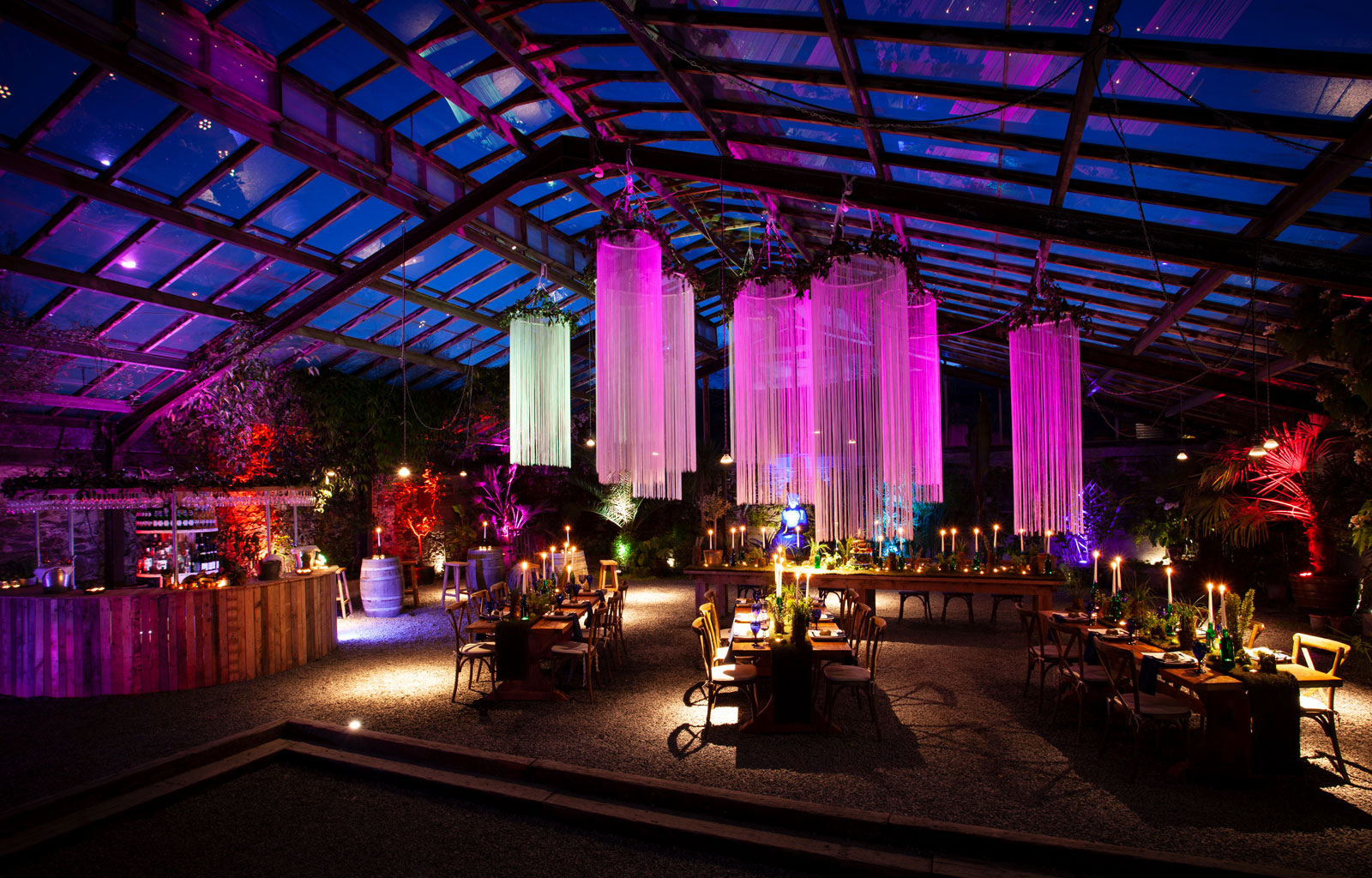 The Glasshouse in the evening at ANRÁN, Devon